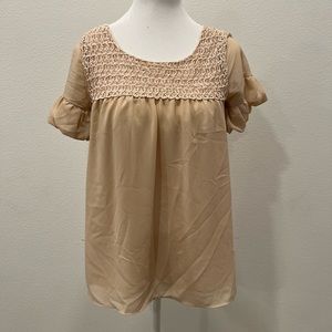 BCBG flowy tan-colored blouse. Size Small.